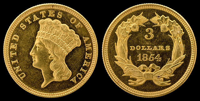 золотые трёхдолларовые монеты времён Золотой лихорадки с изображением Свободы в образе индианки